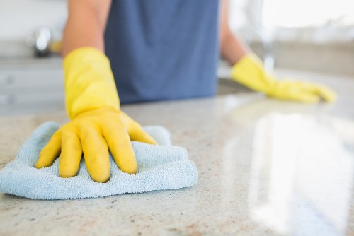 Local cleaner in EC1 performing deep cleaning in a kitchen